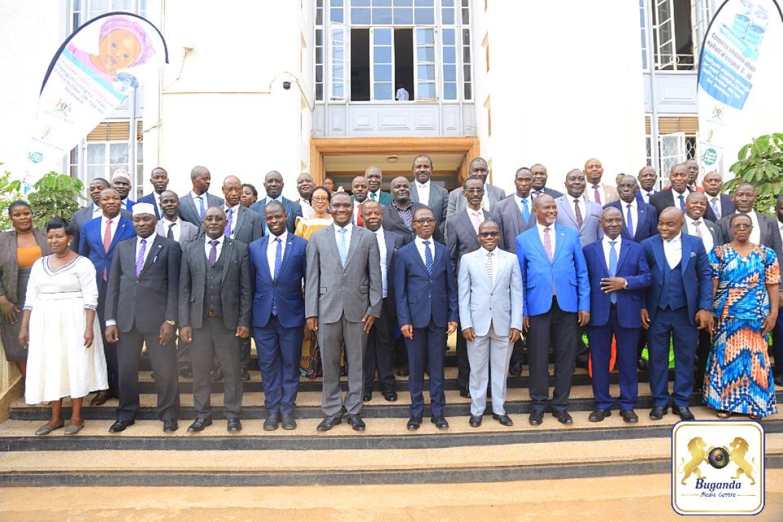 Minister Joseph Kawuki in a group photo with county chiefs, deputies, inspectors, and coordinators after discussing the 2025 work plan Image
